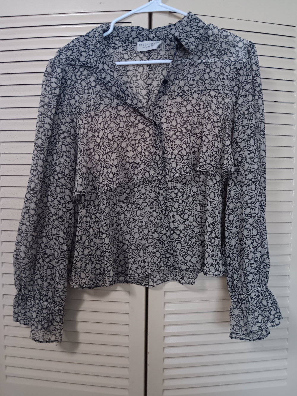 Dress Forum Black & White Floral Ruffle Peplum Blouse